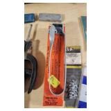 Various Welding Tools and Accessories including Magnetic Holders, Flint Lighter, and Welding Lenses