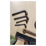 Various Welding Tools and Accessories including Magnetic Holders, Flint Lighter, and Welding Lenses