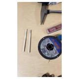 Various Welding Tools and Accessories including Magnetic Holders, Flint Lighter, and Welding Lenses