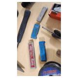 Various Welding Tools and Accessories including Magnetic Holders, Flint Lighter, and Welding Lenses