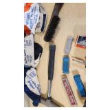 Various Welding Tools and Accessories including Magnetic Holders, Flint Lighter, and Welding Lenses