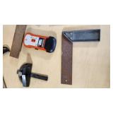 Assorted Hand Tools including Levels, Squares, and Chalk Lines