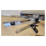 Assorted Hand Tools including Levels, Squares, and Chalk Lines