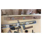 Assorted Hand Tools including Levels, Squares, and Chalk Lines