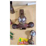 Various Automotive Accessories and Tools including Hitch Ball Mount, Tire Gauge, and Air Fresheners