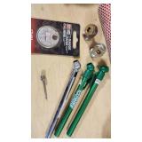 Various Automotive Accessories and Tools including Hitch Ball Mount, Tire Gauge, and Air Fresheners