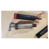 Lot of Hand Tools and Hardware Items including Grease Guns, Hooks, Chains, and Hinges