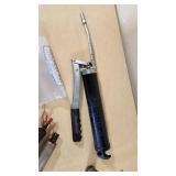 Lot of Hand Tools and Hardware Items including Grease Guns, Hooks, Chains, and Hinges