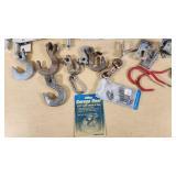 Lot of Hand Tools and Hardware Items including Grease Guns, Hooks, Chains, and Hinges