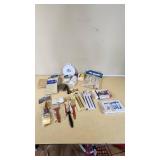 Assorted Paint and Craft Supplies including Acrylic Paint Set, Paint Brushes, Sand Paper, and Drop Cloth