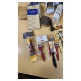 Assorted Paint and Craft Supplies including Acrylic Paint Set, Paint Brushes, Sand Paper, and Drop Cloth