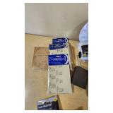 Assorted Paint and Craft Supplies including Acrylic Paint Set, Paint Brushes, Sand Paper, and Drop Cloth