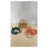 Green, yellow, and orange extension cords