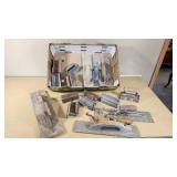 Lot of Masonry Tools including Various Trowels and Floats, Corner Trowels, and Miscellaneous Tools