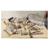 Set of Vintage Masonry Tools including Trowels, Floats, and Hammers
