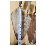 Set of Vintage Masonry Tools including Trowels, Floats, and Hammers