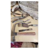 Set of Vintage Masonry Tools including Trowels, Floats, and Hammers