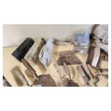 Set of Vintage Masonry Tools including Trowels, Floats, and Hammers