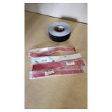 Reflective Strip Tape and Roll of Rubberized Tape