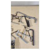 Assorted hand tools including Allen wrenches, magnetic pickup tools, and other accessories