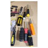 Various Hand Tools including Performax T25 Torx Insert Bit and Screwdriver Set, Mixed Driver Bits, and Accessories