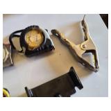 Lot of Hand Tools including Tape Measures, Metal Clamp, and Metal Holder