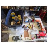 Assorted Painting and Home Improvement Tools including Brush Cleaner, Caulk Gun, and Respirator