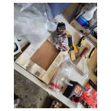 Assorted Painting and Home Improvement Tools including Brush Cleaner, Caulk Gun, and Respirator