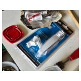 Plumbing and Hardware Tools and Supplies including Washing Machine Hose, Water Heater Connector, and Various Fittings