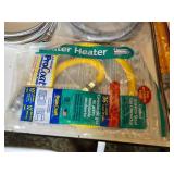 Plumbing and Hardware Tools and Supplies including Washing Machine Hose, Water Heater Connector, and Various Fittings