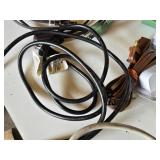 Assorted Electrical Components including APC Surge Protector, Power Strips, Extension Cords, and NEMA Enclosure
