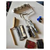 Drywall Tools and Supplies including Rolls of Tape, Trowels, and Sanding Tools