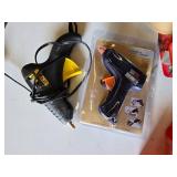 Assorted Tape and Adhesive Tools including Glue Guns, Tape Dispensers, and Plastic Mender