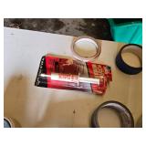 Assorted Tape and Adhesive Tools including Glue Guns, Tape Dispensers, and Plastic Mender