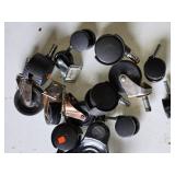 Lot of Casters and Wheels Including Swivel, Fixed, and Dual Wheel Types