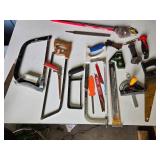 Assorted Hand Tools including Hacksaws, Hand Saws, and Measuring Tools