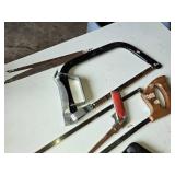 Assorted Hand Tools including Hacksaws, Hand Saws, and Measuring Tools