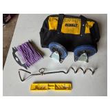 DeWalt Tool Bag and Accessories including Casters, Purple Rope, Tie Out Stake, and Small Level