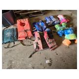 Various Life Jackets and Flotation Devices