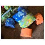 Various Life Jackets and Flotation Devices