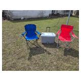 Blue and Red Folding Camp Chairs with Rubbermaid Wheeled Cooler