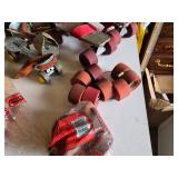 Vintage Roller Skates and Accessories Including Riedell Boots, Red Strap Skates, and Spare Wheels