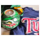 Green Bay Packers Favre #4 Jersey, Minnesota Twins Shirt, and Minnesota Wild Candle Holder