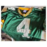 Green Bay Packers Favre #4 Jersey, Minnesota Twins Shirt, and Minnesota Wild Candle Holder
