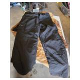 Carhartt Jacket 4XL, Camo Coveralls XL, and Black Snow Pants