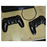 Sony PlayStation 4 Console with DualShock Controllers - Powers On, Needs a Cleaning