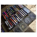 Collection of DVDs including Spider-Man, Fantastic 4, and The Incredible Hulk