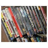 Lot of DVD Movies and TV Shows Including "Doom", "Lexx", "True Grit", and More
