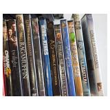 Lot of DVDs including "Pirates of the Caribbean," "Inception," and "Edward Scissorhands," among others