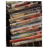 Lot of DVDs and CDs including Ted, Last Man Standing, and Journey to Adventure CD-ROM